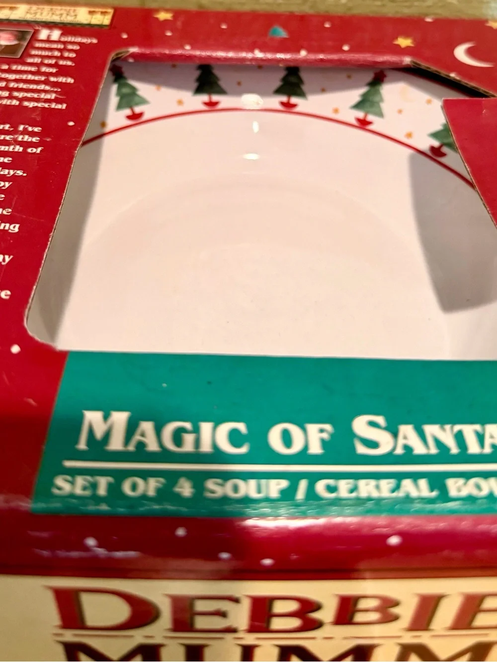 From my mom’s personal collection is this charming Debbie Mumm “Magic of Santa”